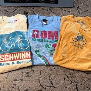 Biking tee shirts.  3. Two large one extra large.